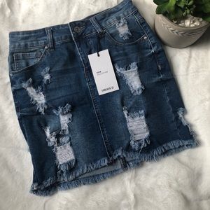 For every 21 distressed denim skirt